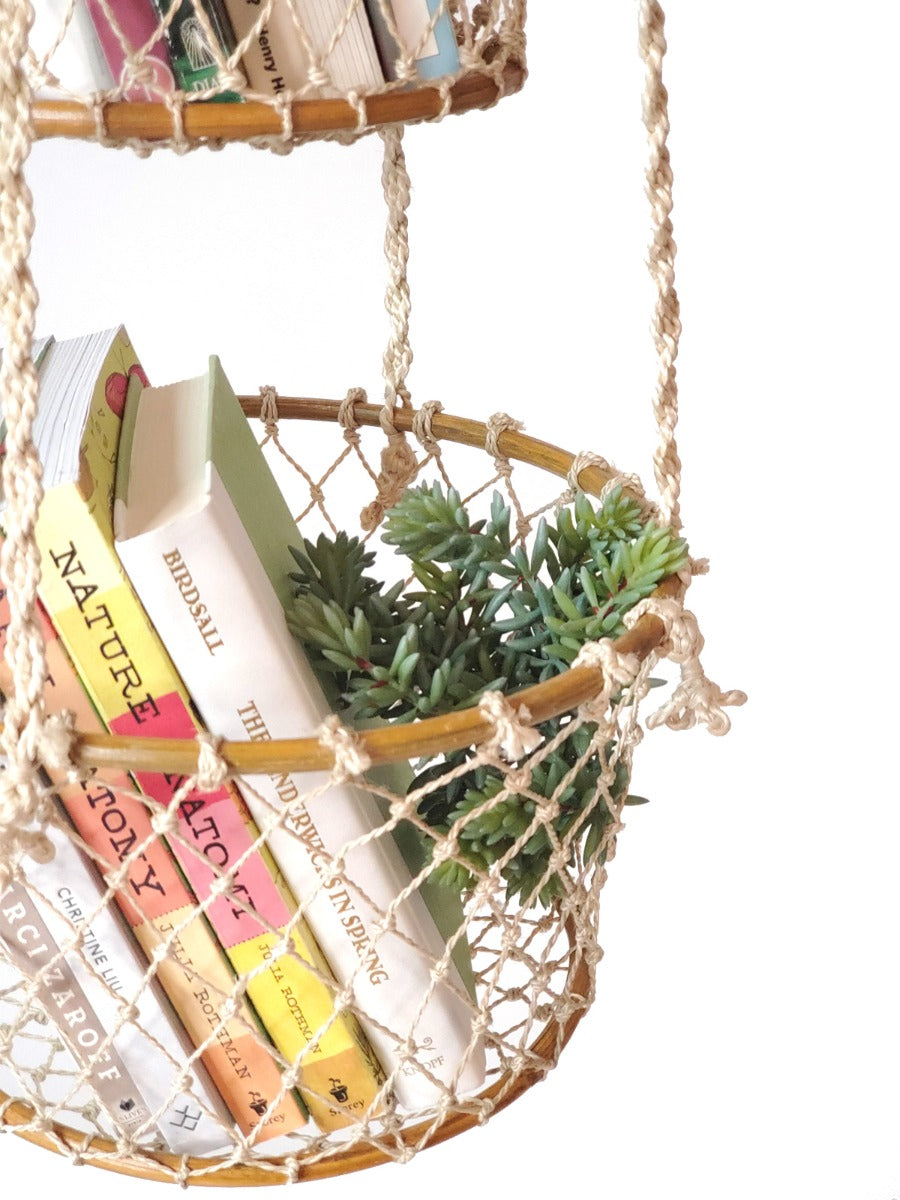 Jhuri double hanging Basket with books and a plant