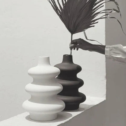 Sculptural black Mezo Vase displayed as a contemporary decorative accent.
