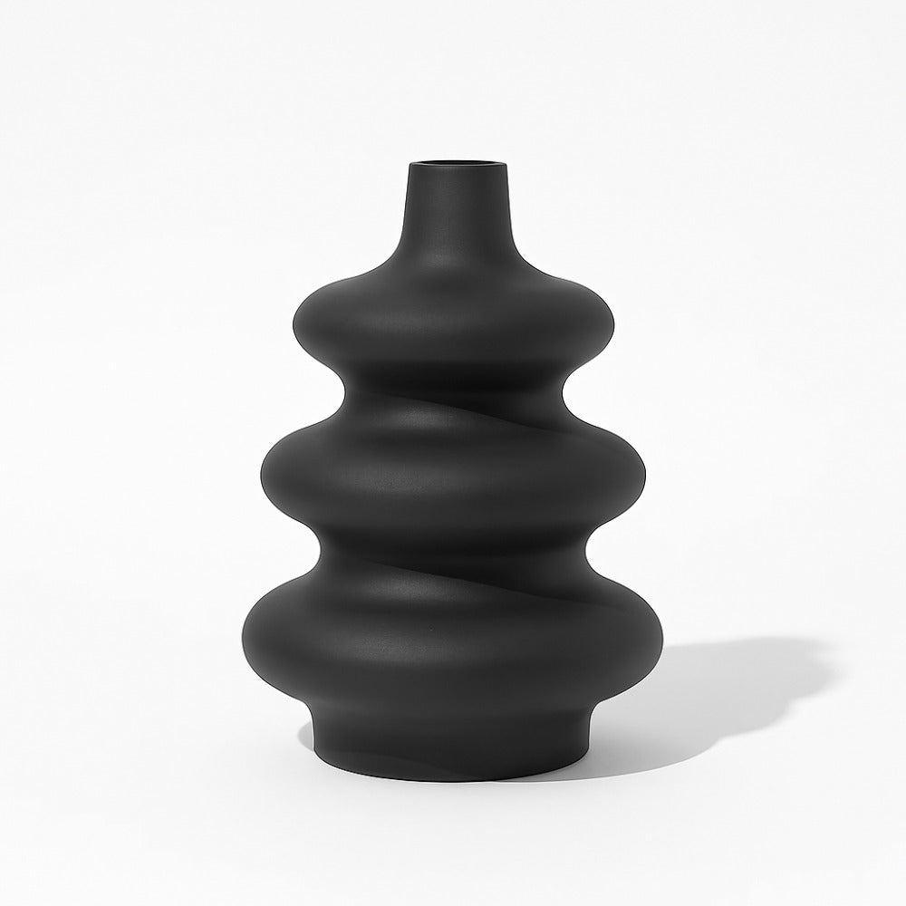 Sculptural black Mezo Vase displayed as a contemporary decorative accent.