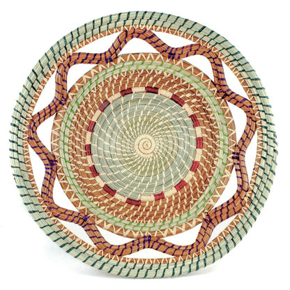 Celestina handwoven basket crafted from pine needles, pajon grass and colorful raffia.