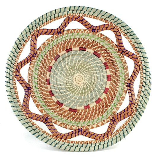 Celestina handwoven basket crafted from pine needles, pajon grass and colorful raffia.